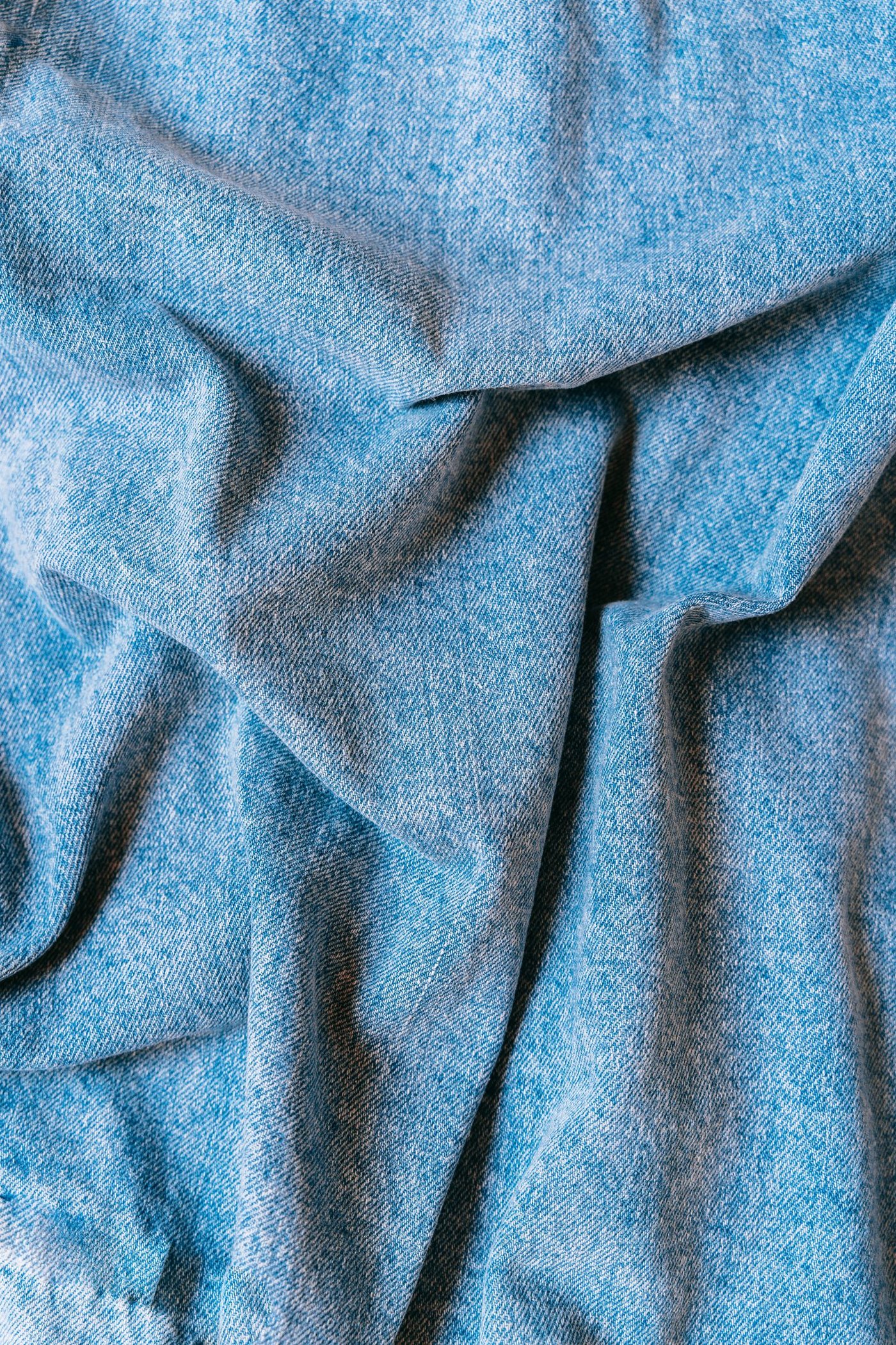 Privacy Policy Soft folds of washed denim fabric