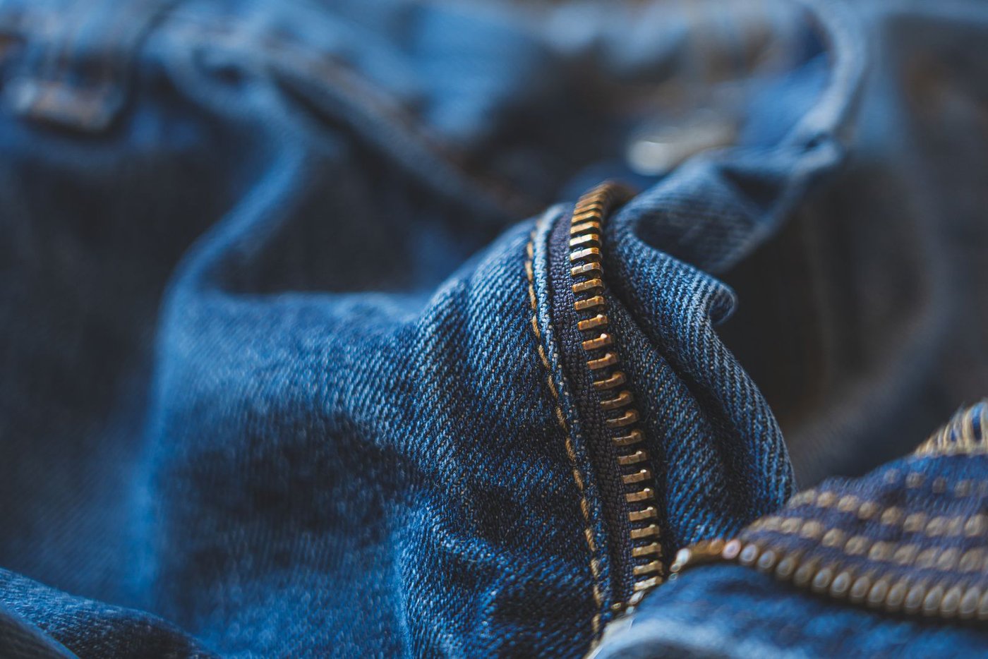 Fabric & Care Denim fly and zip detail in close-up