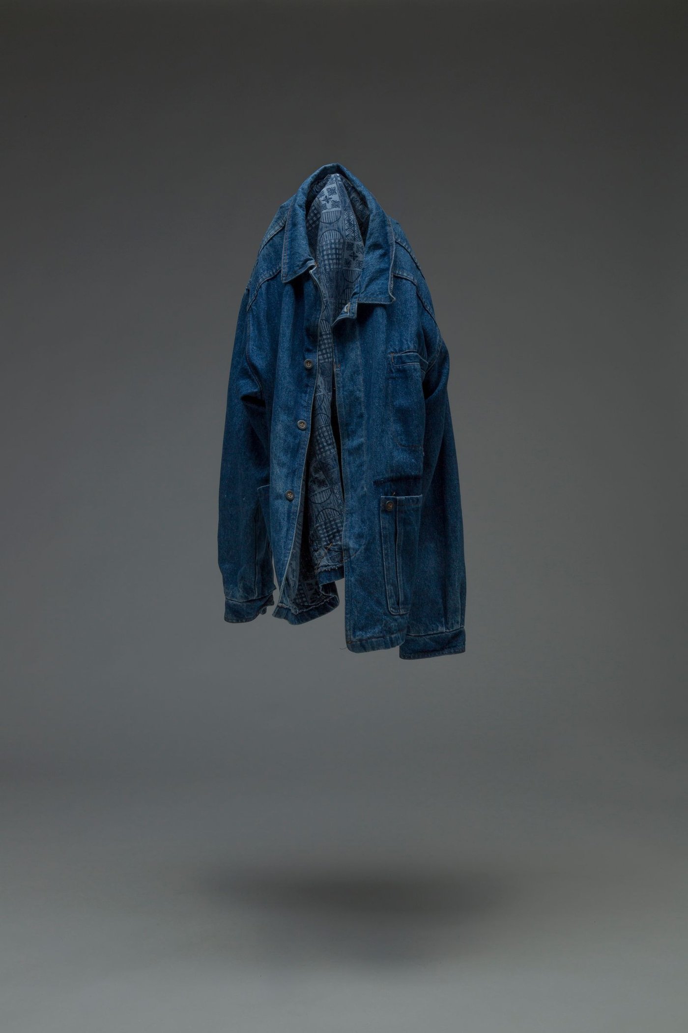 Jacket Float Denim jacket photographed against a plain dark background