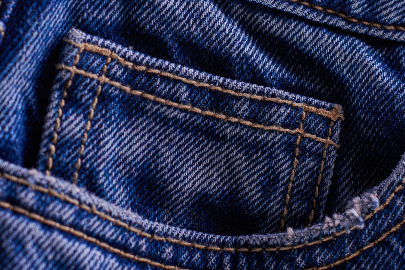 Cookie Policy Back pocket and stitching on blue denim